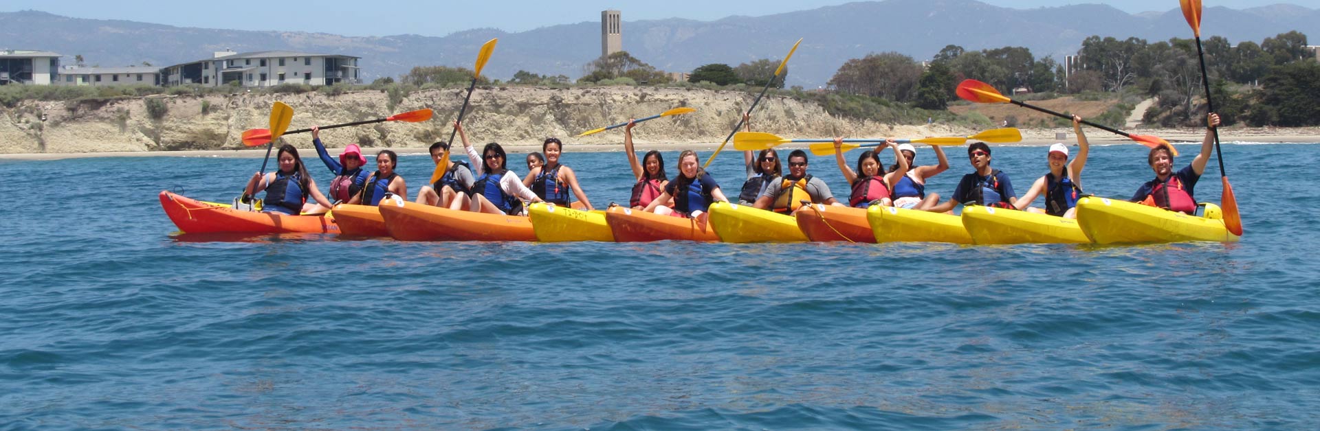 Group of kayakers on the ocean during a Santa Barbara Channelkeeper community engagement event.